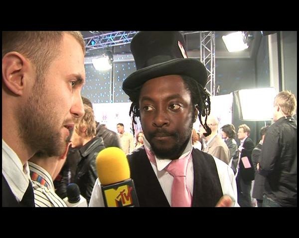 Mick Baltic interviewing Wyclef Jean on the red carpet at the MTV VMAs, NYC, 2006